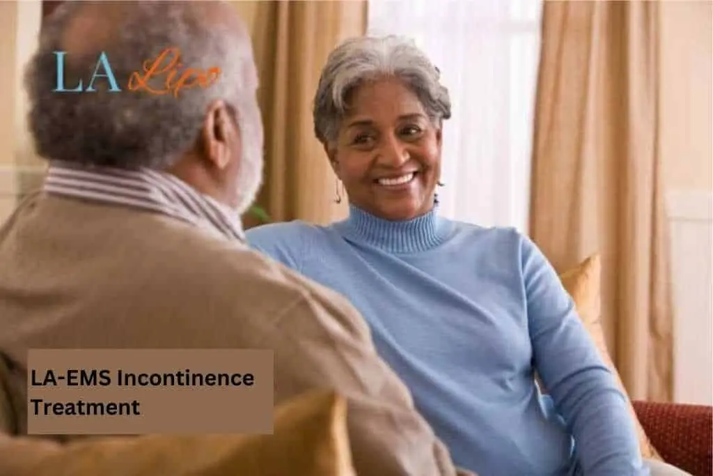Couple sat smiling at each other - LA-EMS treatment Stoke